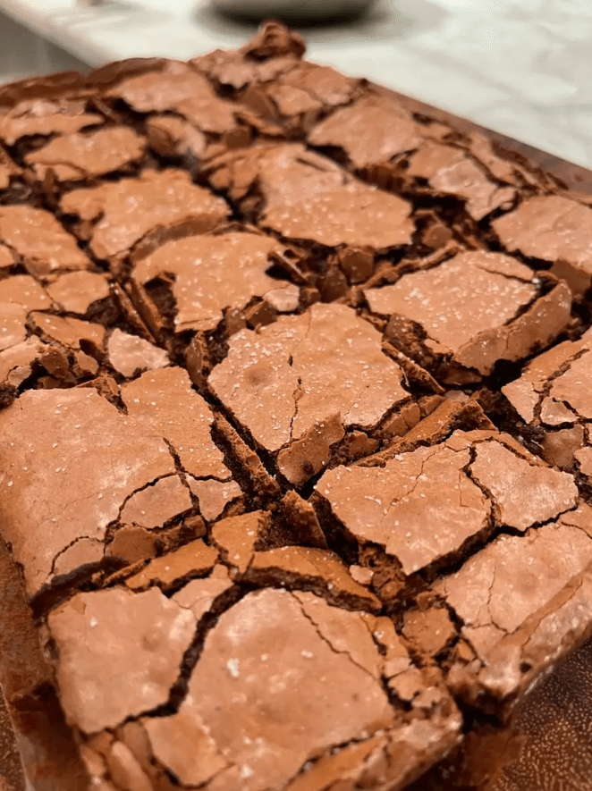 Gluten-free brookie recipe featuring a soft cookie base and rich, gooey brownie top.